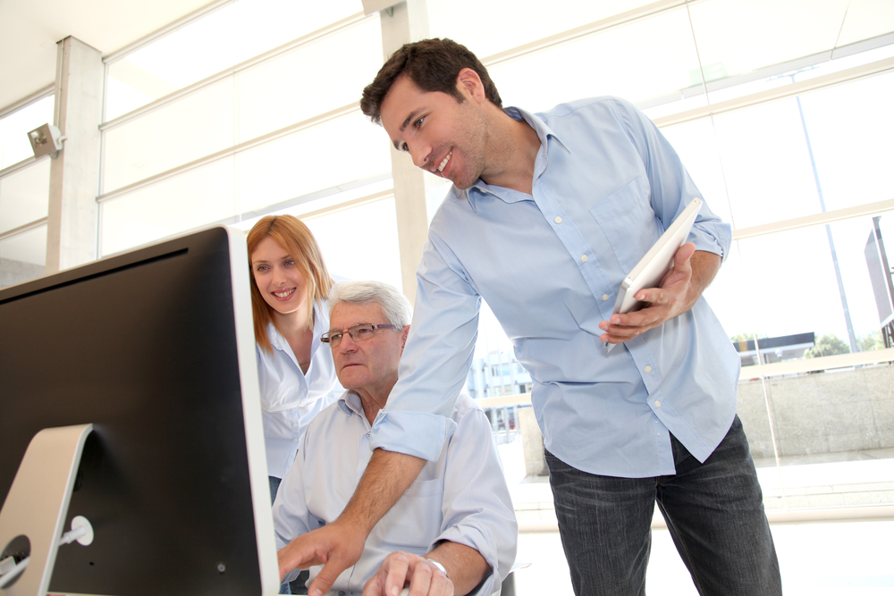 Senior people attending business training